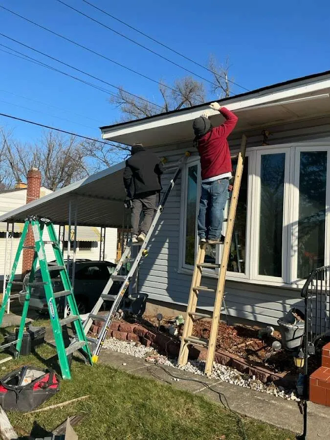Restoration crew performing exterior repair in Griswold